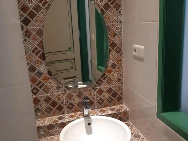 Rumah Jawa Guest House (Syariah) : photo 3 de la chambre chambre lits jumeaux deluxe