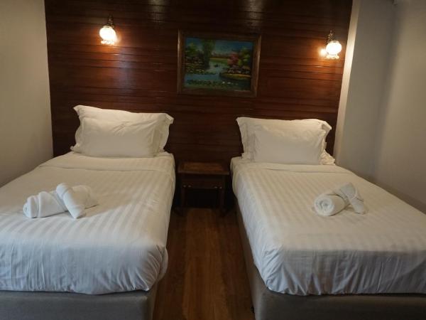 Ingmon House : photo 2 de la chambre chambre lits jumeaux supérieure - vue sur jardin