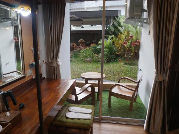 Ingmon House : photo 5 de la chambre chambre lits jumeaux supérieure - vue sur jardin