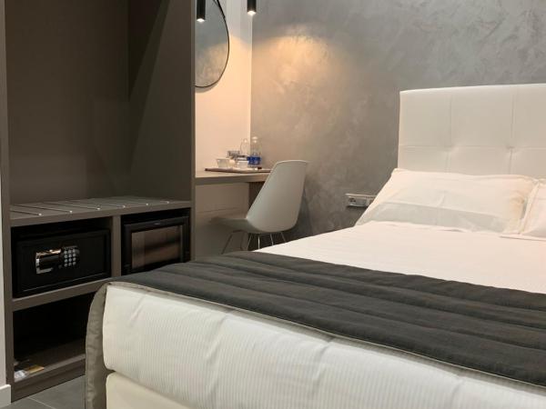 ApartHotel Bossi : photo 1 de la chambre grande chambre simple