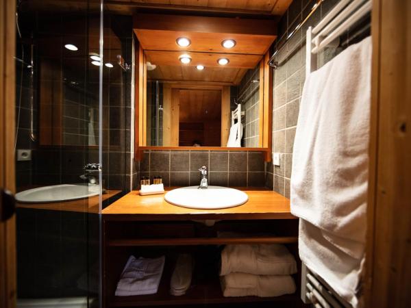 La Savoyarde : photo 2 de la chambre chambre simple avec douche - côté village