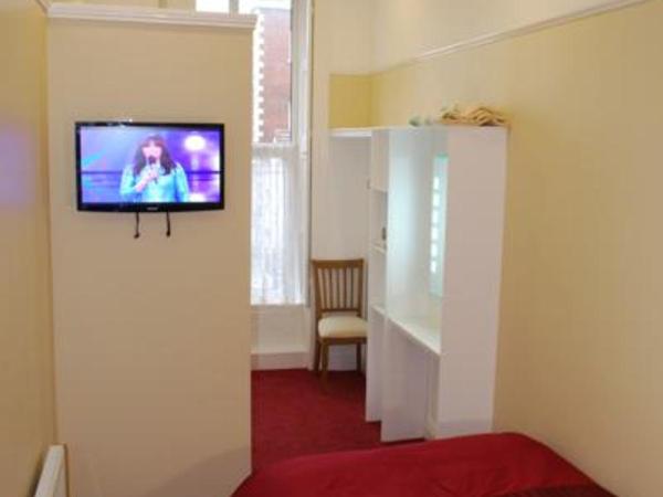 Parkway Guesthouse : photo 1 de la chambre chambre simple avec salle de bains privative