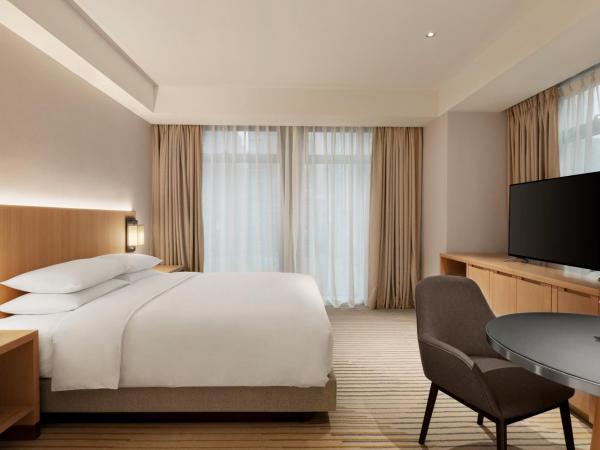 Hyatt Place Chengdu Pebble Walk : photo 3 de la chambre suite lit king-size avec canapé-lit