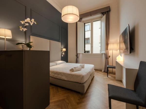 Daphne Guest House : photo 2 de la chambre suite familiale