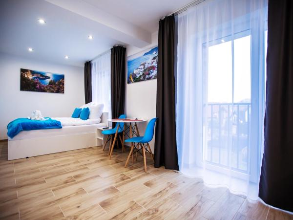 Adonis Apartments : photo 3 de la chambre chambre double Économique