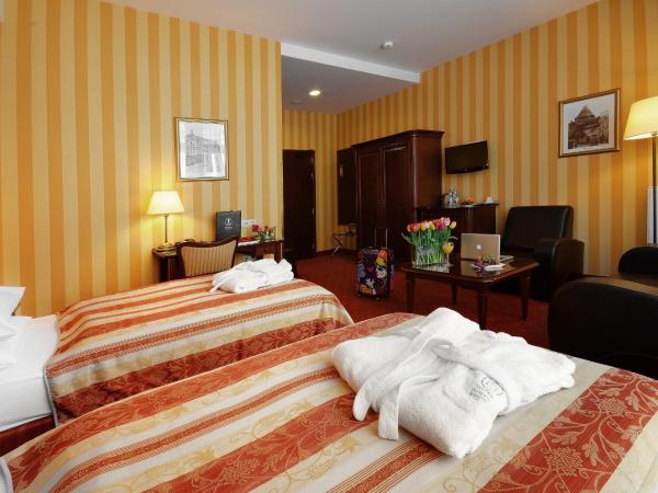 Hotel Wolne Miasto Old Town Gdańsk : photo 2 de la chambre chambre deluxe double ou lits jumeaux
