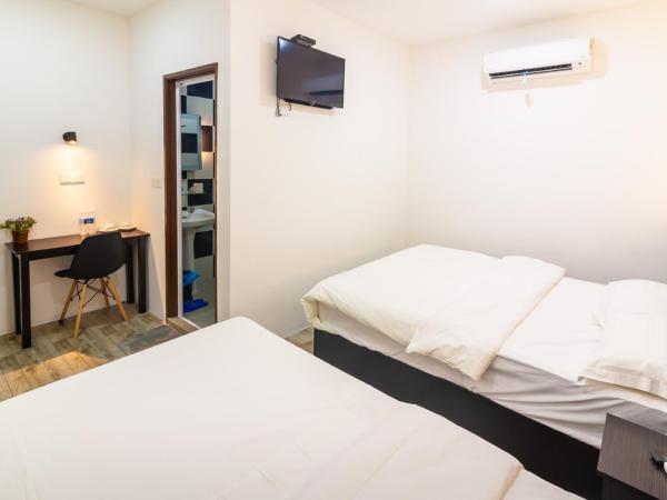 Tambun Warm Hotel : photo 2 de la chambre chambre triple