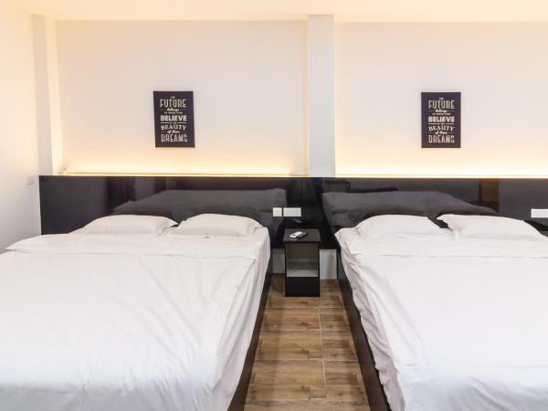 Tambun Warm Hotel : photo 7 de la chambre chambre familiale deluxe