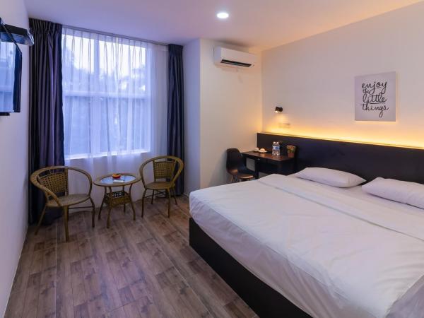 Tambun Warm Hotel : photo 2 de la chambre chambre lit king-size deluxe