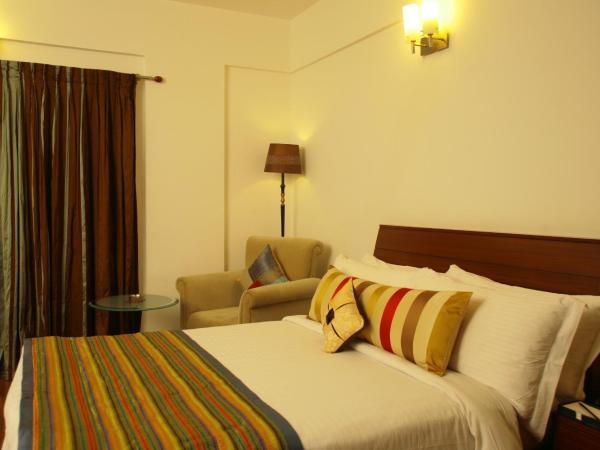 juSTa Off MG Road : photo 6 de la chambre chambre double de luxe