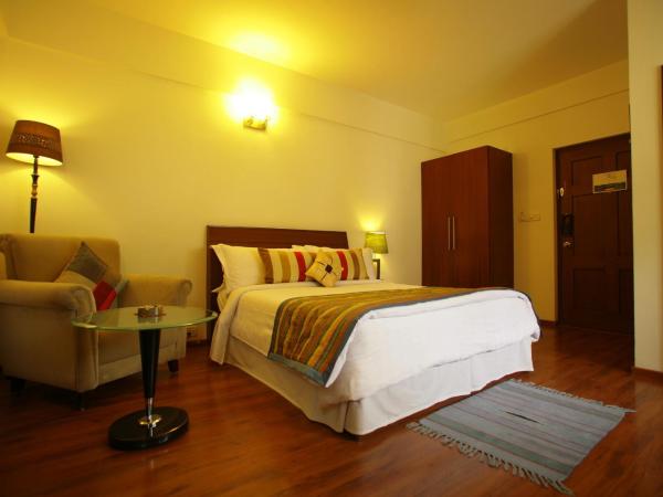 juSTa Off MG Road : photo 4 de la chambre chambre double de luxe