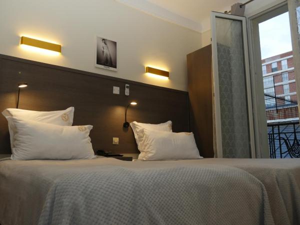 Hotel Novex Paris : photo 7 de la chambre chambre lits jumeaux