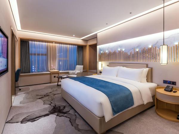 Mercure Chengdu Huapaifang : photo 2 de la chambre chambre lit king-size deluxe