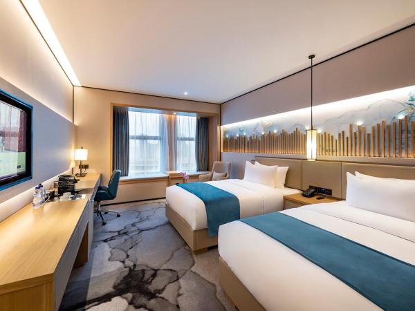 Mercure Chengdu Huapaifang : photo 4 de la chambre chambre lits jumeaux exécutive