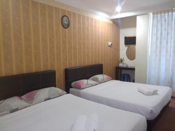 Hotel Tropicanna Pulai Point : photo 1 de la chambre chambre familiale