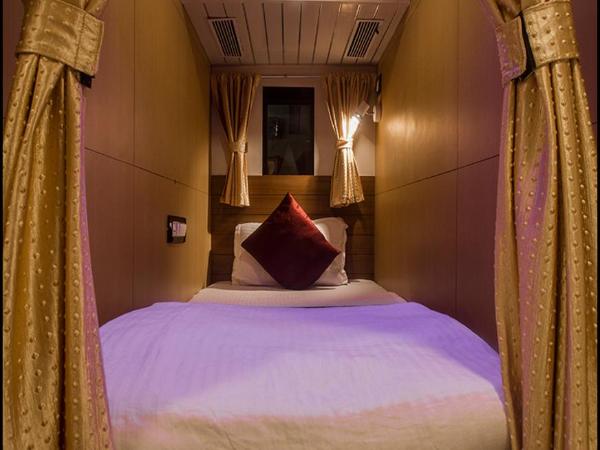 Qubestay Airport Capsule Hotel & Hostel : photo 3 de la chambre lit simple dans dortoir à 6 lits