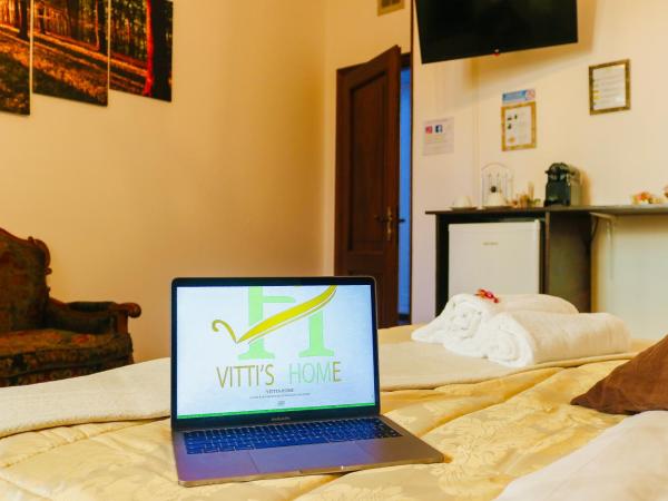 Vitti's Home Verona : photo 1 de la chambre chambre triple avec salle de bains privative