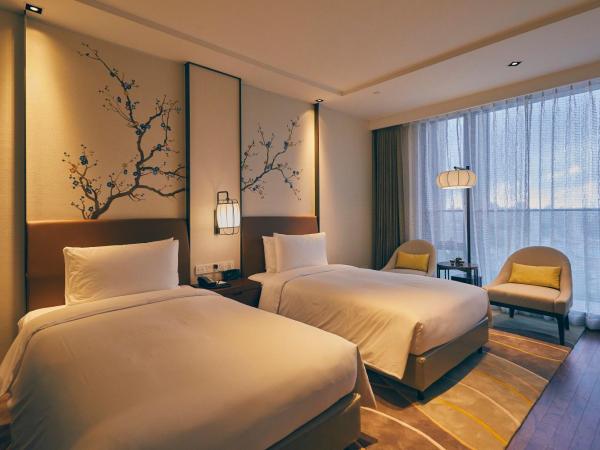 LJZ Supreme Tower Hotel : photo 2 de la chambre chambre lits jumeaux supérieure