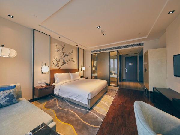 LJZ Supreme Tower Hotel : photo 2 de la chambre chambre supérieure lit queen-size