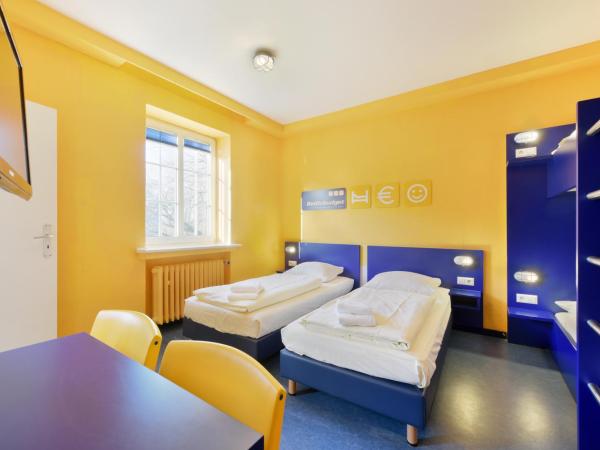 Bed'nBudget Expo-Hostel Rooms : photo 1 de la chambre chambre familiale avec salle de bains privative