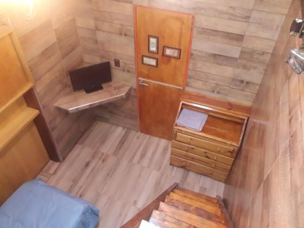 Hostel Ruca Potu : photo 1 de la chambre chambre triple avec salle de bains commune
