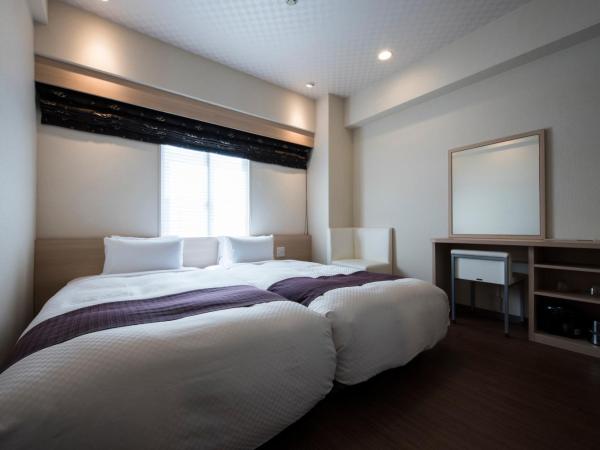 Nagasaki Bus Terminal Hotel : photo 1 de la chambre chambre lits jumeaux supérieure - non-fumeurs