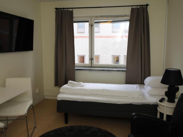 Fastliving Apartment Hotel : photo 2 de la chambre petit studio