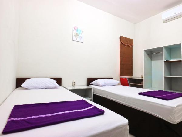 Casa Sidoluhur 17 : photo 1 de la chambre chambre double standard avec salle de bains commune