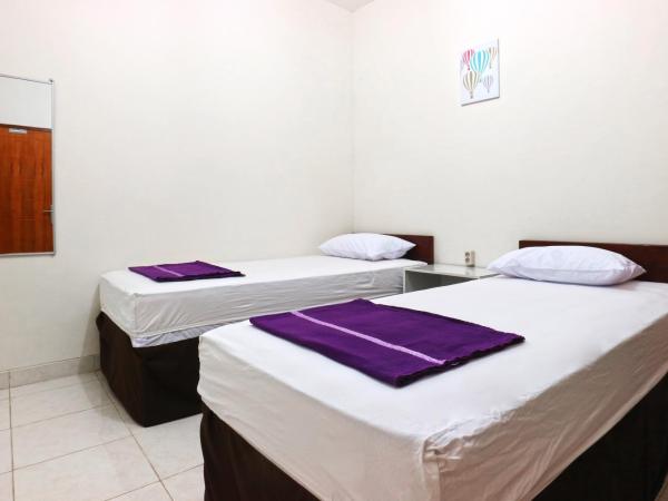 Casa Sidoluhur 17 : photo 4 de la chambre chambre double standard avec salle de bains commune