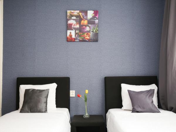 Hotel Flipper Amsterdam : photo 1 de la chambre chambre lits jumeaux avec salle de bains privative