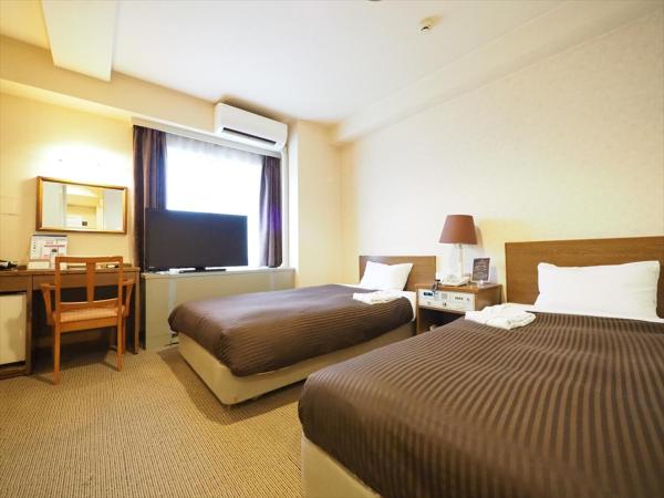 Sky Heart Hotel Hakata : photo 1 de la chambre chambre lits jumeaux - fumeurs