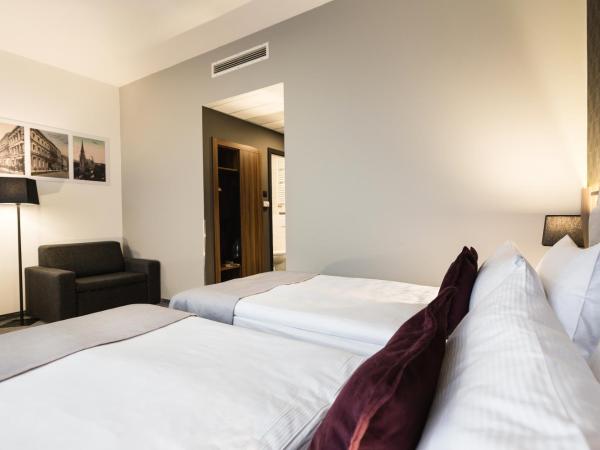 Best Western Hotel Mariacki Katowice : photo 6 de la chambre chambre lits jumeaux standard avec canapé