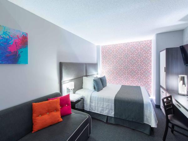 Travelodge by Wyndham Montreal Centre : photo 8 de la chambre chambre lit queen-size d'angle avec canapé-lit - non-fumeurs