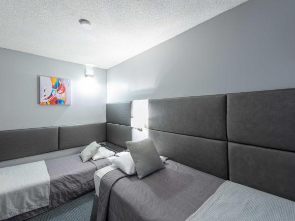 Travelodge by Wyndham Montreal Centre : photo 1 de la chambre chambre lits jumeaux acessible aux personnes à mobilité réduite - non-fumeurs