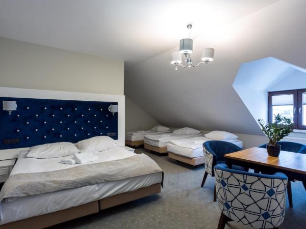 Dworek Jabłonna : photo 1 de la chambre chambre familiale