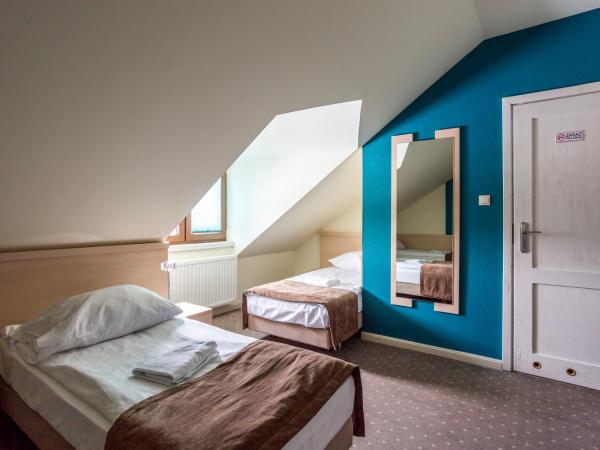 Dworek Jabłonna : photo 3 de la chambre chambre triple confort