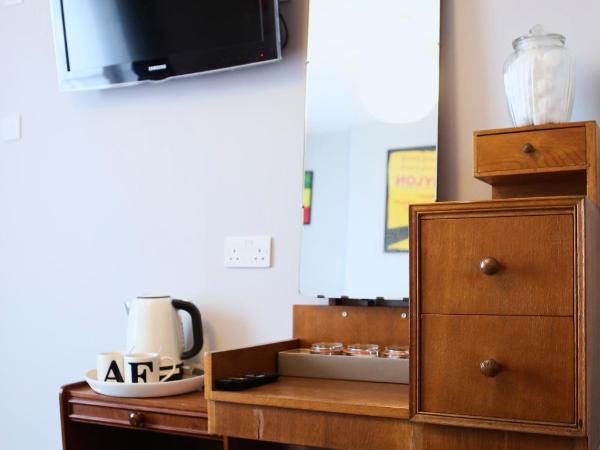 The Dark Horse Pub : photo 9 de la chambre chambre lit king-size