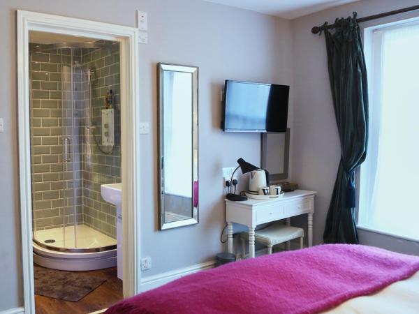 The Dark Horse Pub : photo 9 de la chambre chambre lit king-size