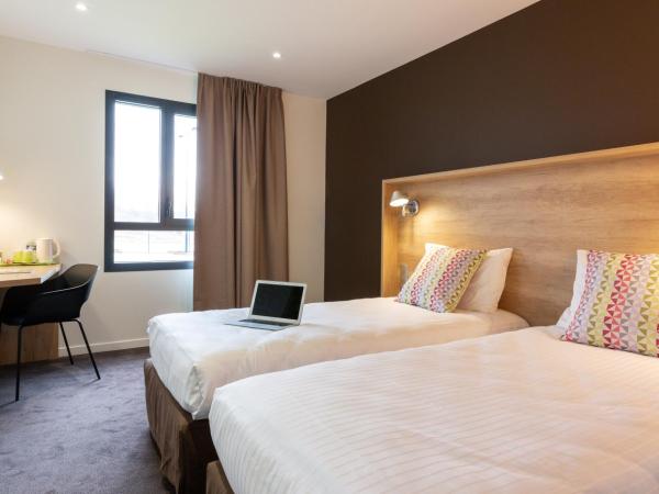 Campanile Laval Nord : photo 4 de la chambre chambre lits jumeaux