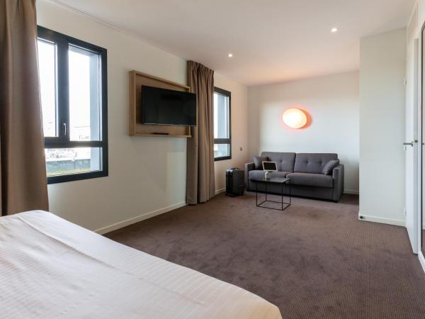 Campanile Laval Nord : photo 4 de la chambre chambre nouvelle génération avec 2 lits doubles