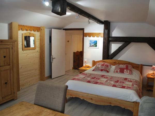 Chalet l'Aiglon : photo 4 de la chambre chambre quadruple - vue sur montagnes