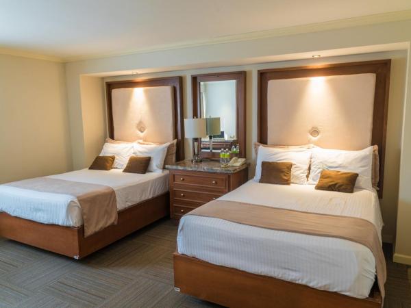 Rose Hotel : photo 2 de la chambre chambre deluxe avec 2 lits doubles