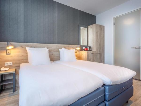 Joy Hotel : photo 3 de la chambre chambre lits jumeaux deluxe