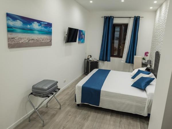 B&B Elegance : photo 1 de la chambre chambre double ou lits jumeaux avec salle de bains privative