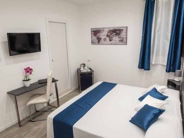 B&B Elegance : photo 4 de la chambre chambre double ou lits jumeaux avec salle de bains