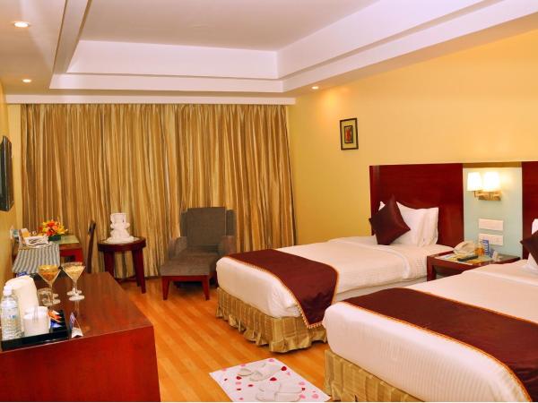 Gokulam Park Sabari-Siruseri SIPCOT : photo 2 de la chambre deluxe twin room with free drop to sipcot it park