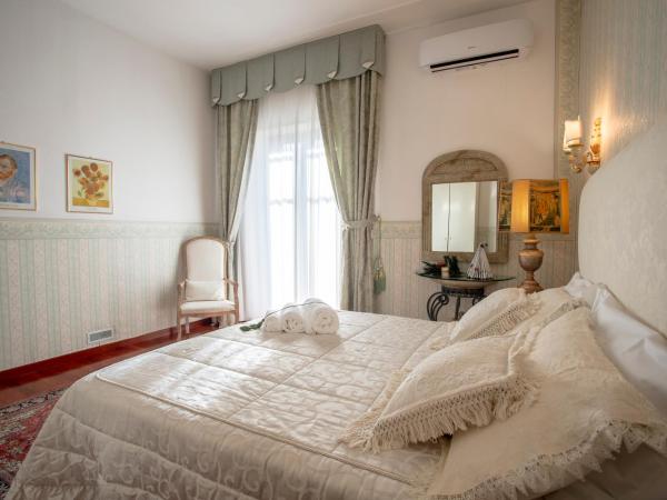 A due passi olbia : photo 10 de la chambre chambre lit king-size deluxe