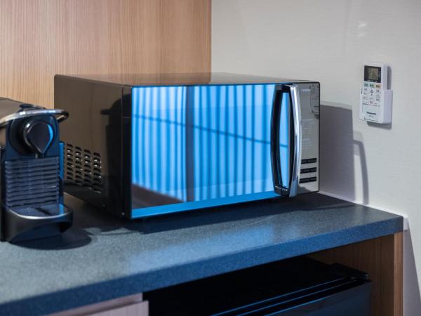 Tomoya Residence Hotel Kyoto : photo 5 de la chambre suite 1 chambre lits jumeaux avec kitchenette - vue sur jardin - rez-de-chaussée