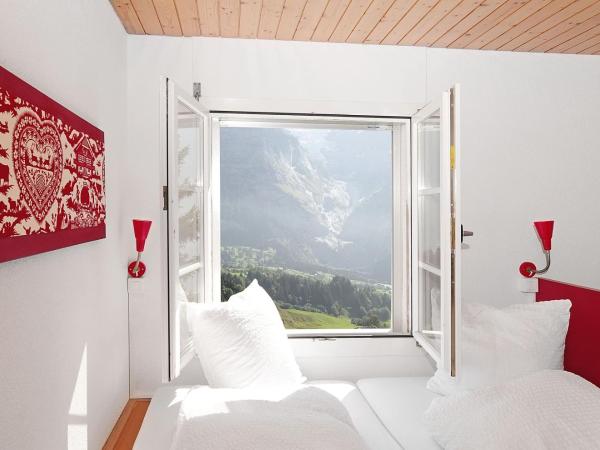 Alpinhotel Bort : photo 2 de la chambre chambre sextuple - vue sur l'eiger