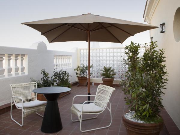 Petit Palace Triball : photo 1 de la chambre chambre double avec terrasse - annexe